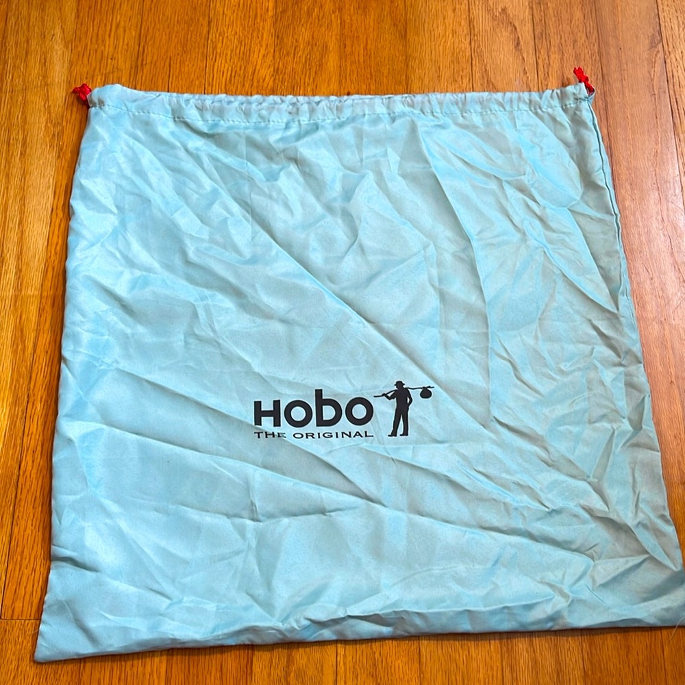 HOBO dust bag. 18”x18”. Light teal with red drawstring.